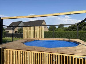 GRE above ground ROUND pool in wood terrasse 1330x1000 2